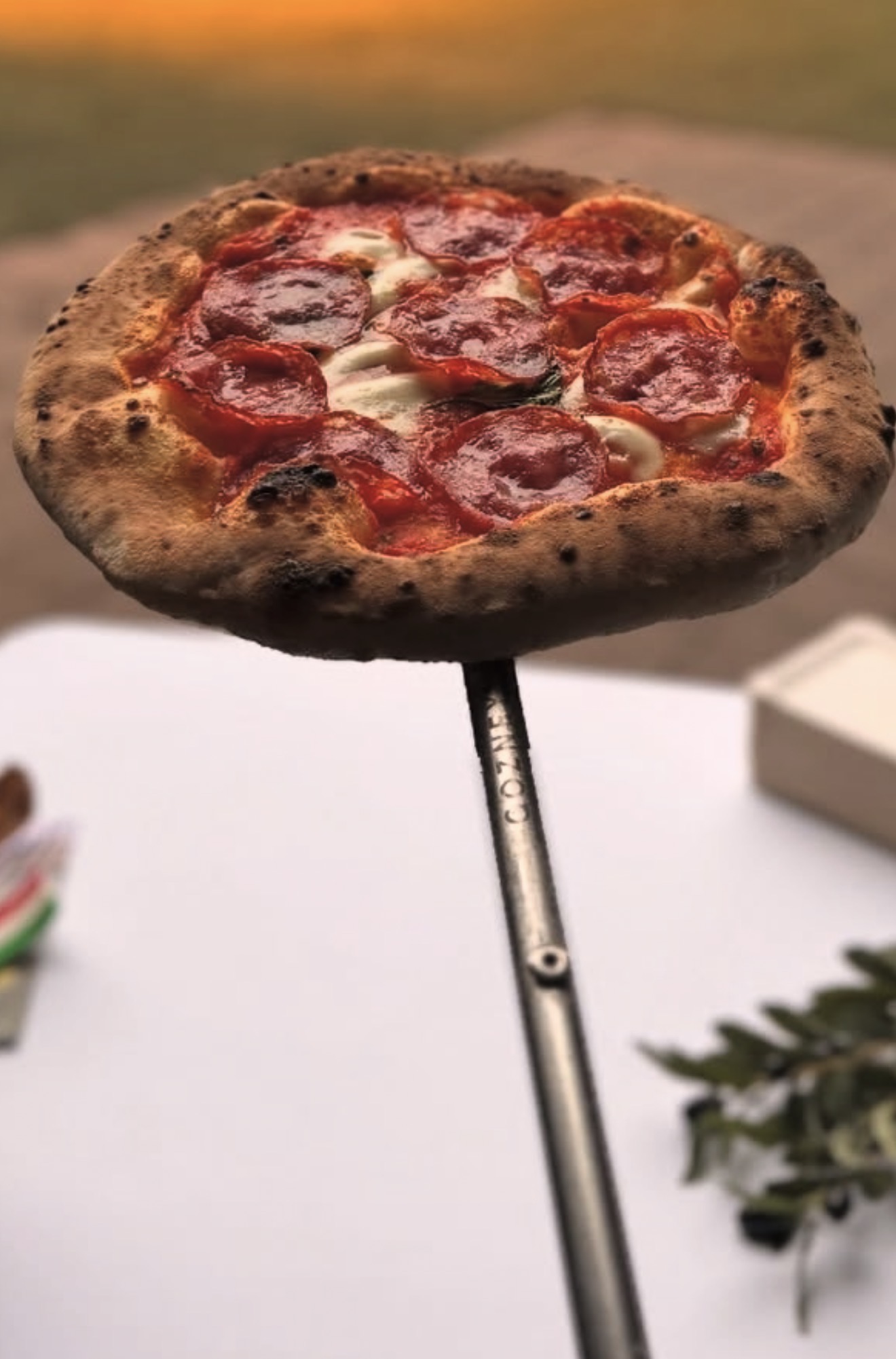 Artisan pizza on peel
